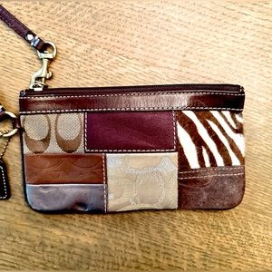 Beautiful wristlet from years ago but pristine.